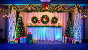 A festive holiday event with custom backdrop decorations