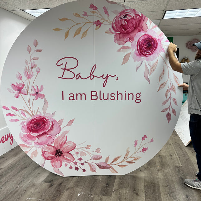 ROUND Cut to Shape Foam Backdrop featuring floral design with text 'Baby, I am Blushing'