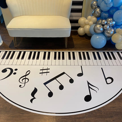 Custom die cut floor adhesive with piano keys and music notes design for creative spaces