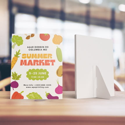 Colorful summer market easel-back cards for retail and events displayed on a table
