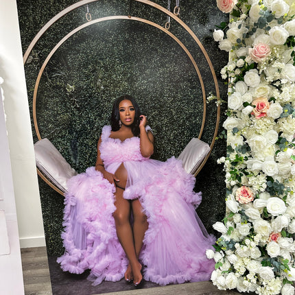 WPEProduction extra large foam prints backdrop featuring woman in pink ruffled gown against green and gold circular design