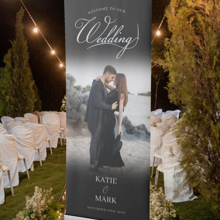 Personalized pull up banner for business displaying a wedding welcome message with couple photo and names Katie and Mark