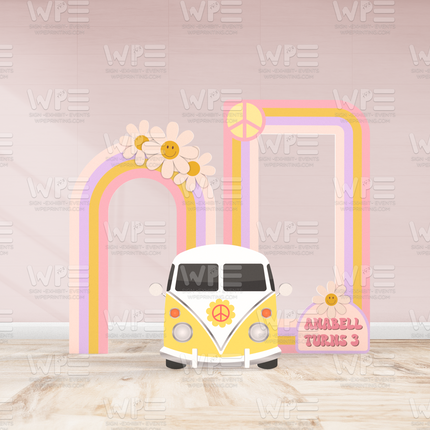 Groovy birthday backdrop decorations featuring a yellow van, peace sign, rainbow arches, and flowers for a birthday party