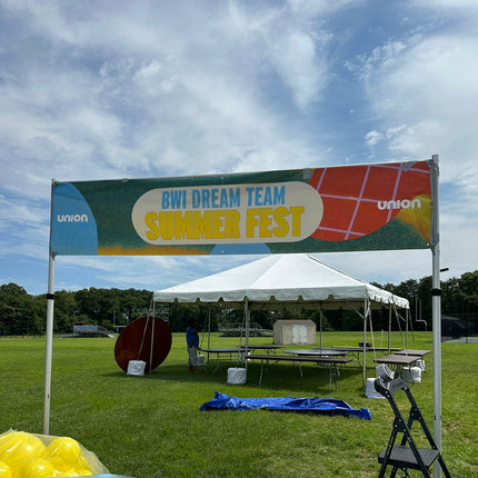 Custom printed vinyl banners for BWI Dream Team Summer Fest event display in a grassy area