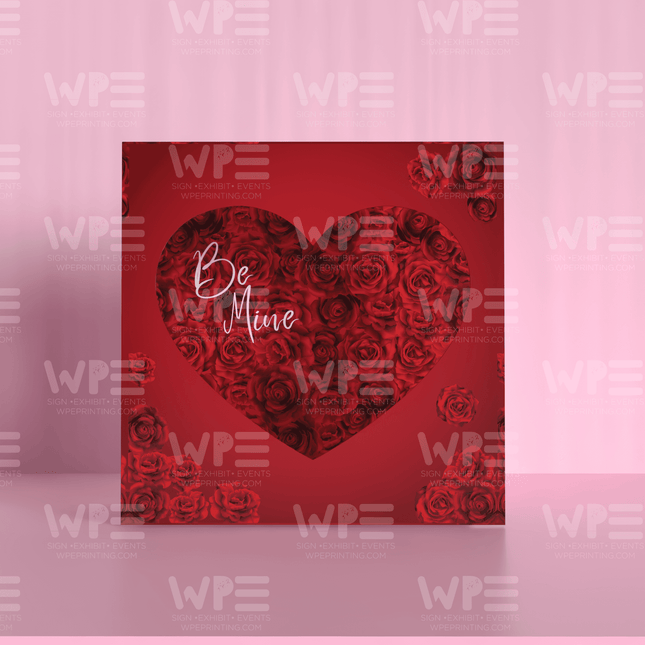 Valentine’s Day magazine photo booth prop - heart frame featuring red roses and the text Be Mine